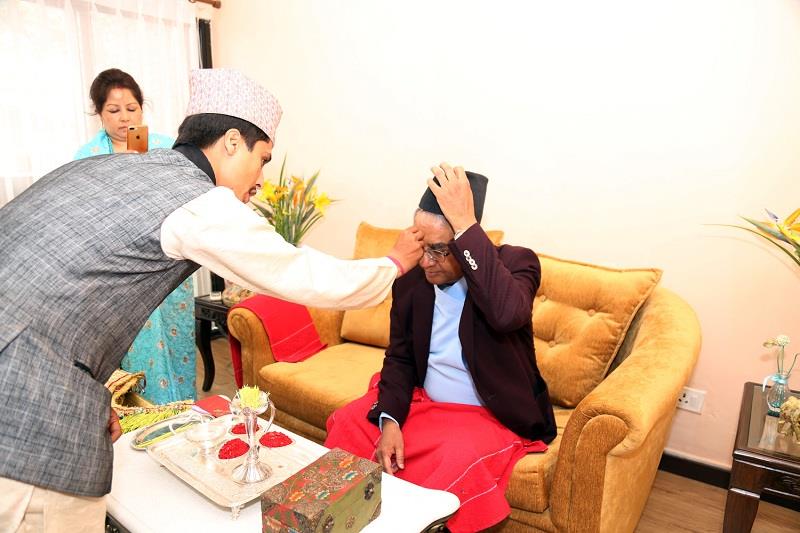 Nepal PM having tika in dashain